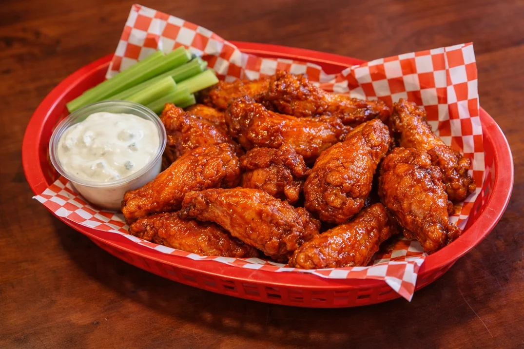 Crispy boneless wings with dipping sauce in London Ontario